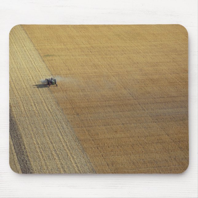 A tractor harvesting mouse pad (Front)