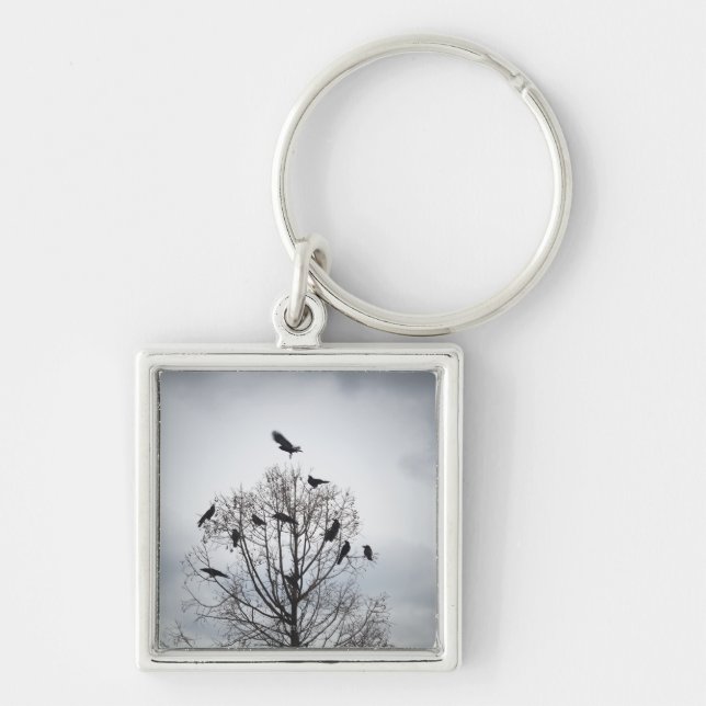 A tree in which many crows have rest key ring (Front)