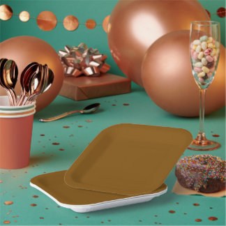 A uniform warm brown background with subtle paper plate