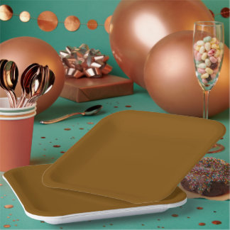 A uniform warm brown background with subtle paper plate