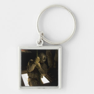 A US Air Force pararescueman begins his descent Key Ring