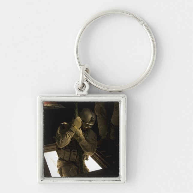 A US Air Force pararescueman begins his descent Key Ring (Front)