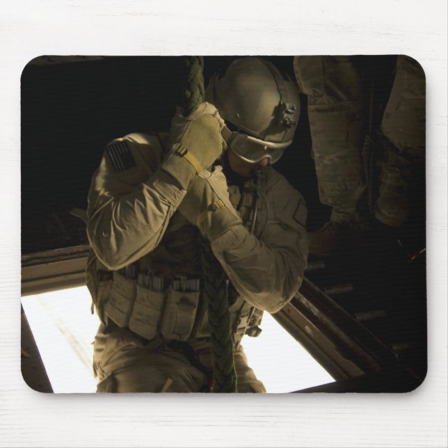 A US Air Force pararescueman begins his descent Mouse Pad (Front)