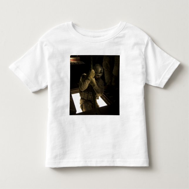 A US Air Force pararescueman begins his descent Toddler T-Shirt (Front)