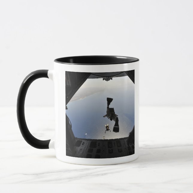 A US Air Force pararescueman jumping out Mug (Left)