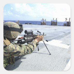 A US Marine adjusting his weapon Square Sticker
