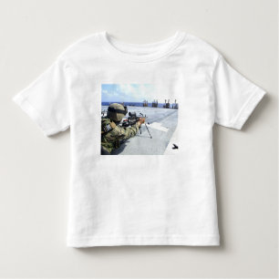 A US Marine adjusting his weapon Toddler T-Shirt