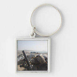 A US Marine fires a mortar in Salinas, Peru Key Ring