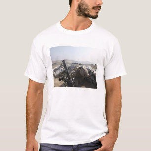 A US Marine fires a mortar in Salinas, Peru T-Shirt