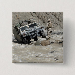 A US Marine guiding the driver of a Humvee 15 Cm Square Badge