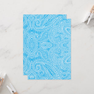 A vibrant blue fabric featuring intricate patterns invitation