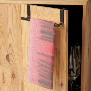 A vibrant graphic design features a red, patterned tea towel