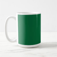 A vibrant green leaf with distinct veins is illumi