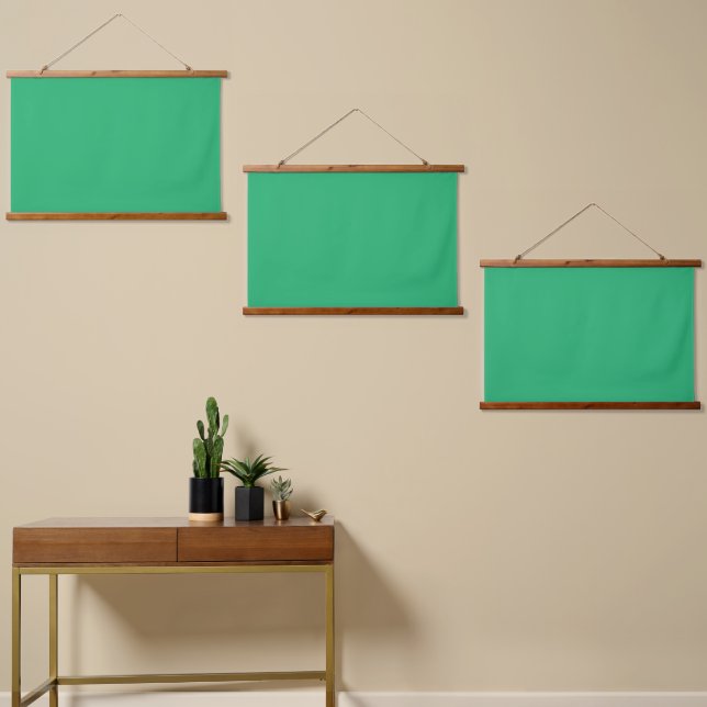 A vibrant green leaf with prominent veins and a de hanging tapestry (Asymmetrical)