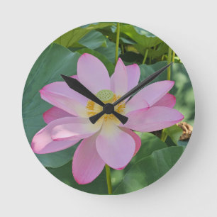 A vibrant lotus flower round clock