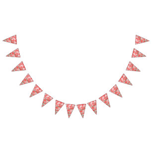 A vibrant red and black scarf displaying a charmin bunting