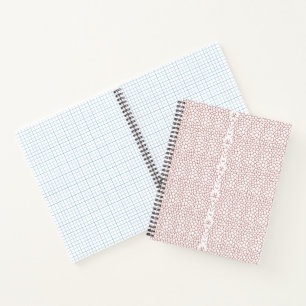 A vibrant rug featuring an intricate geometric mot notebook