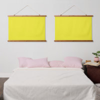 A vibrant yellow square enclosed by a crisp white