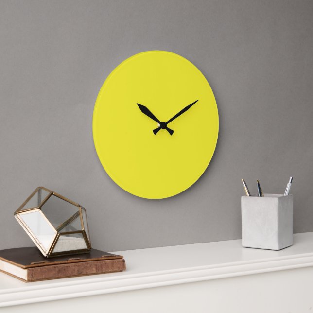A vibrant yellow square enclosed by a crisp white  large clock (Office)