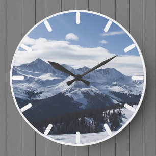 A View of the Snowy Alpine Mountains. Large Clock