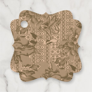 A vintage floral pattern with intricate brown desi favour tags