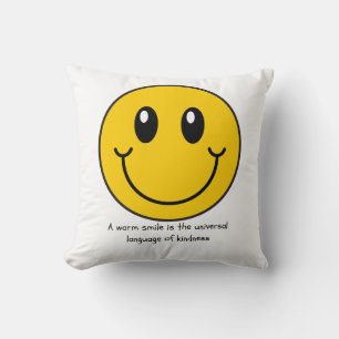 A warm smile is the universal language of kindness cushion