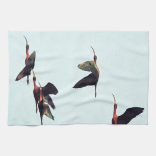 A Wedge of Ibises In Flight Tea Towel