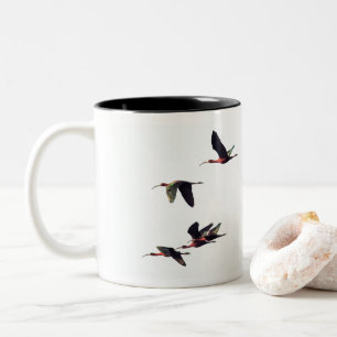 A Wedge of Ibises In Flight Two-Tone Coffee Mug