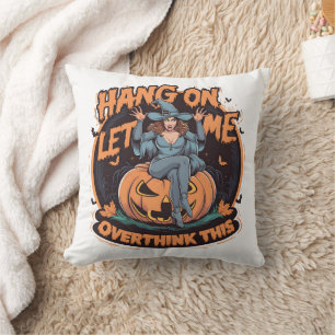 A whimsical witch perched on a pumpkin at dusk cushion