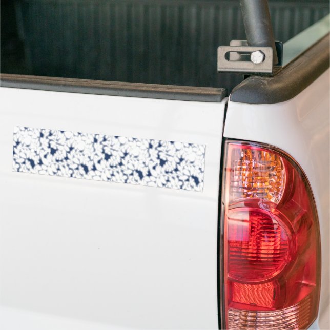 a white and blue background with a pattern bumper sticker (On Truck)