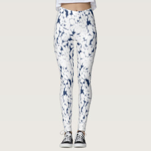 a white and blue background with a pattern leggings