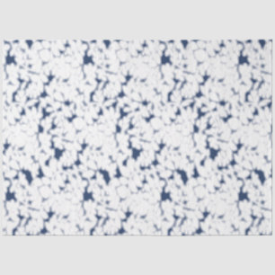 a white and blue background with a pattern tissue paper