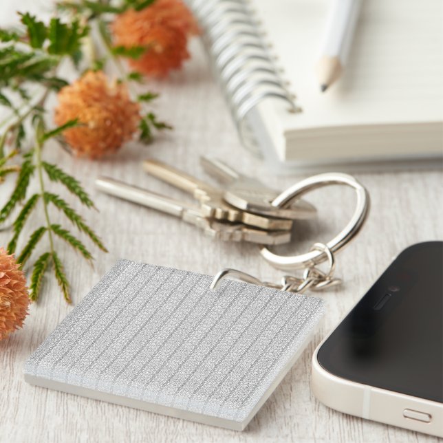A white and grey geometric pattern fills the image key ring (Front Right)