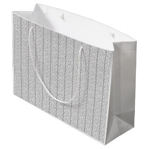 A white and grey geometric pattern fills the image large gift bag