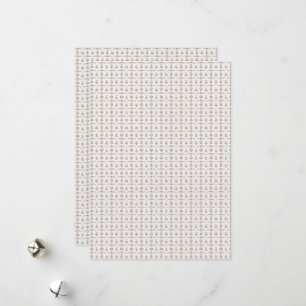 a white background with a brown pattern on it holiday card