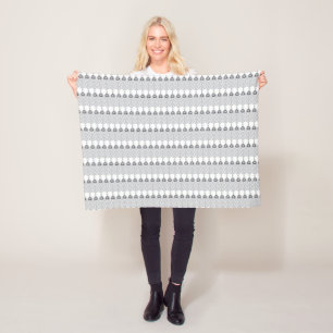a white background with a pattern of circles fleece blanket
