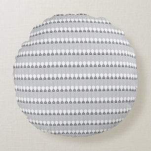 a white background with a pattern of circles round cushion
