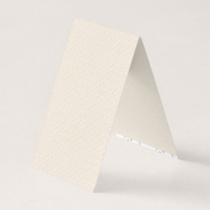a white background with a pattern of small dots business card