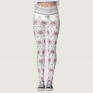a white background with a red pattern on it leggings