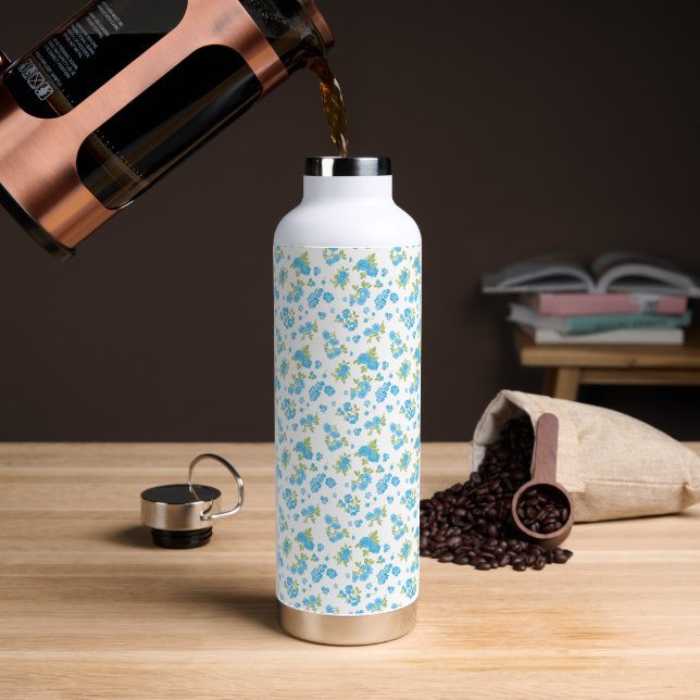 a white background with blue flowers and green lea water bottle (Coffee)