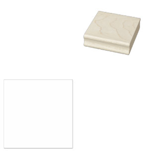 A white, equilateral triangle centred on a plain rubber stamp