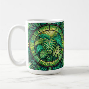 A white mug features a vibrant design of green