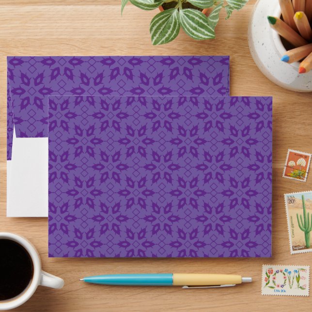 A white wrapping paper with a repeating pattern of envelope (Desk)
