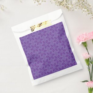 A white wrapping paper with a repeating pattern of favour bag