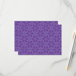A white wrapping paper with a repeating pattern of RSVP card