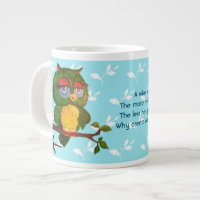 A Wise Old Owl Sitting On A Tree Branch