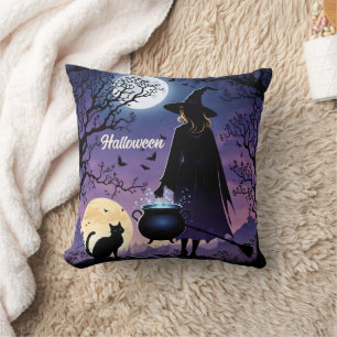 A witch brews potions under the full moon cushion