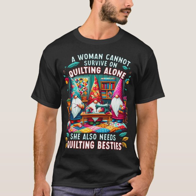 A Woman Cannot Survive On Quilting Alone She Also  T-Shirt (Front)