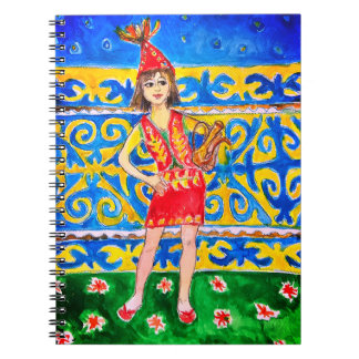 A woman dressed in traditional attire notebook