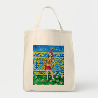 A woman dressed in traditional attire tote bag